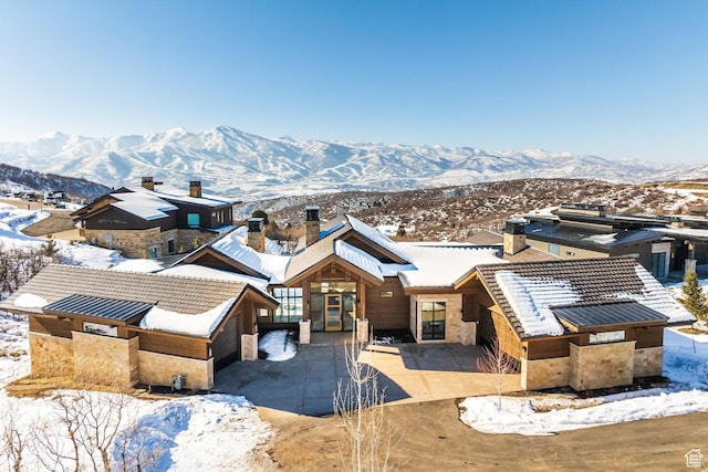 9791 N Uinta Dr, Kamas, UT 84036 - exterior space featuring a tile roof, a mountain view, and concrete driveway