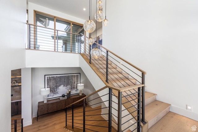 9791 N Uinta Dr, Kamas, UT 84036 - staircase with baseboards and wood finished floors