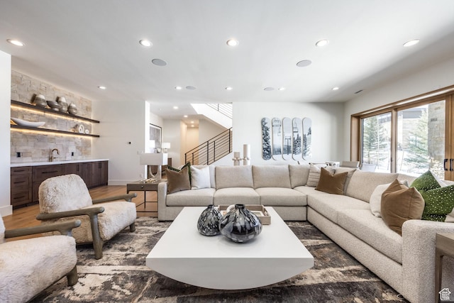 9791 N Uinta Dr, Kamas, UT 84036 - living area with stairs, wet bar, wood finished floors, and recessed lighting