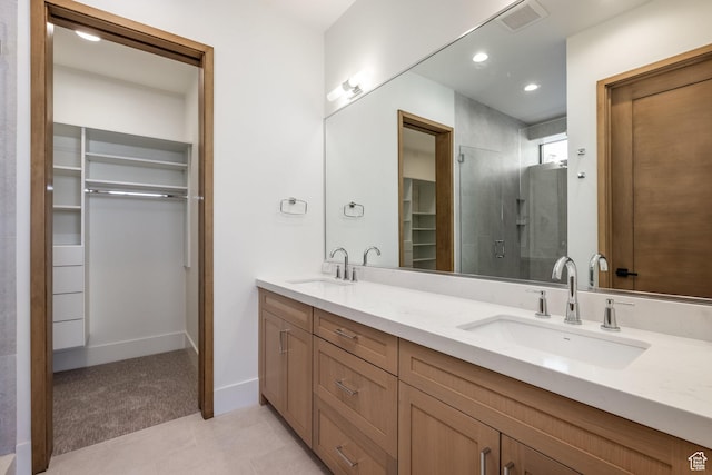 9791 N Uinta Dr, Kamas, UT 84036 - full bath with a shower stall, a spacious closet, visible vents, and a sink