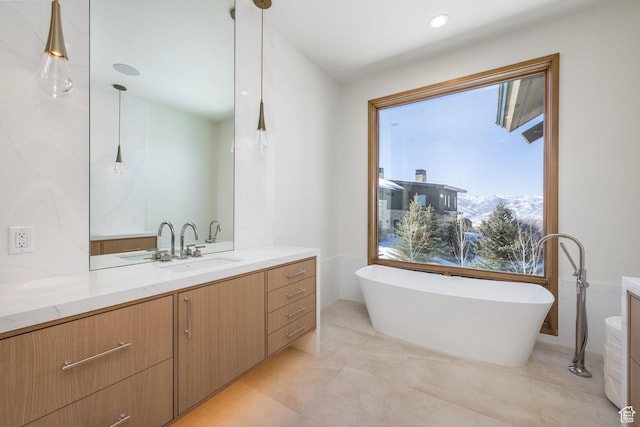 9791 N Uinta Dr, Kamas, UT 84036 - full bathroom featuring tile patterned flooring, a soaking tub, and vanity