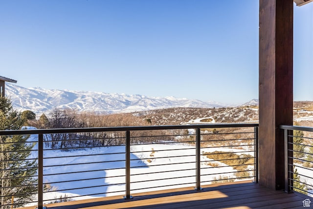 9791 N Uinta Dr, Kamas, UT 84036 - snow covered back of property featuring a mountain view