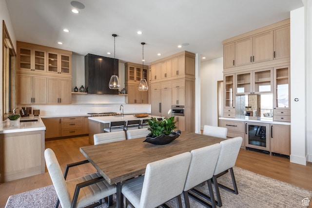 9791 N Uinta Dr, Kamas, UT 84036 - dining space with recessed lighting, light wood-type flooring, and beverage cooler