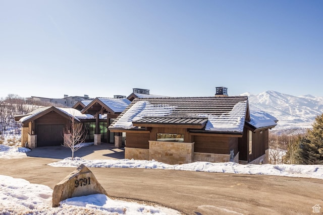 9791 N Uinta Dr, Kamas, UT 84036 - view of front of property with a garage and a chimney