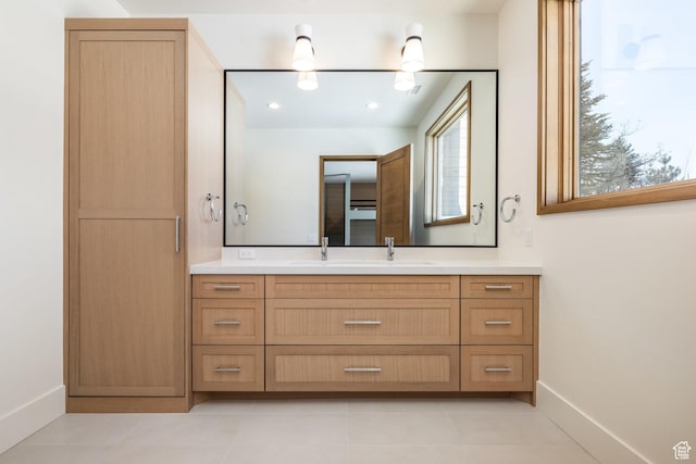 9791 N Uinta Dr, Kamas, UT 84036 - bathroom with baseboards, tile patterned floors, recessed lighting, and vanity