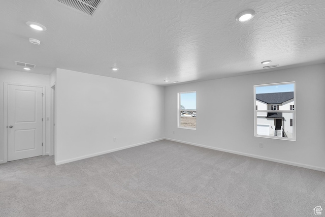 1946 E Burger St Unit 1237, Lake Point, UT 84074 - carpeted spare room with recessed lighting, baseboards, and a textured ceiling