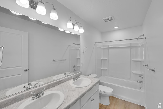 1946 E Burger St Unit 1237, Lake Point, UT 84074 - full bathroom with double vanity, shower / tub combination, toilet, and wood finished floors