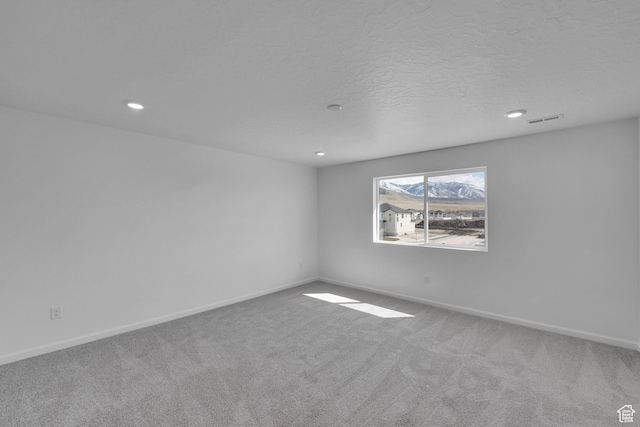1946 E Burger St Unit 1237, Lake Point, UT 84074 - carpeted spare room featuring recessed lighting, baseboards, and a textured ceiling