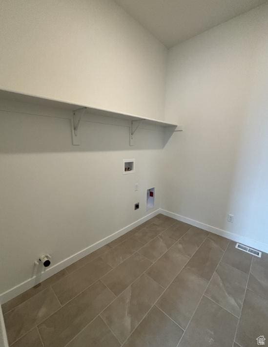 283 E Polaris Dr Unit 102, Saratoga Springs, UT 84045 - laundry area featuring visible vents, baseboards, washer hookup, and laundry area