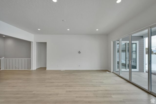 283 E Polaris Dr Unit 102, Saratoga Springs, UT 84045 - spare room featuring light wood-style flooring, recessed lighting, and baseboards