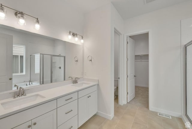 283 E Polaris Dr Unit 102, Saratoga Springs, UT 84045 - full bath featuring a shower stall, double vanity, visible vents, and a sink