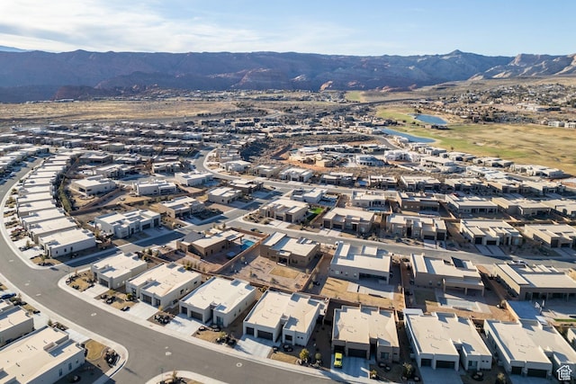 drone / aerial view featuring a mountain view