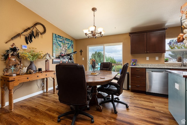 1361 S Roadrunner Cir, Kanab, UT 84741 - dining area with an inviting chandelier, lofted ceiling, and wood-type flooring