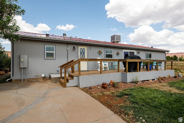 1361 S Roadrunner Cir, Kanab, UT 84741 - back of property featuring a patio area and central air condition unit