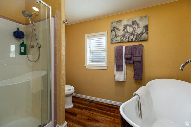1361 S Roadrunner Cir, Kanab, UT 84741 - bathroom with wood-type flooring, toilet, and a shower with shower door