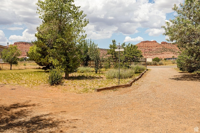 1361 S Roadrunner Cir, Kanab, UT 84741 - view of yard with a mountain view