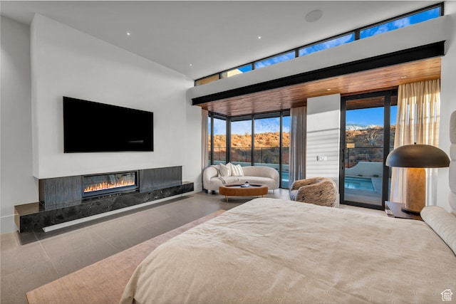 63 E Colima Rd, Washington, UT 84780 - bedroom with access to outside and a high end fireplace