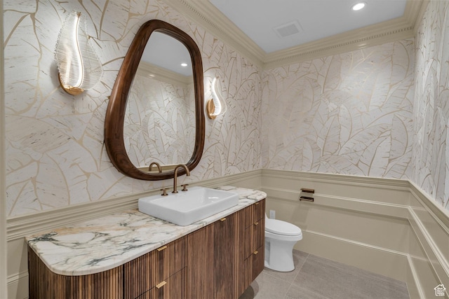 63 E Colima Rd, Washington, UT 84780 - bathroom featuring wallpapered walls, a wainscoted wall, toilet, vanity, and tile patterned flooring
