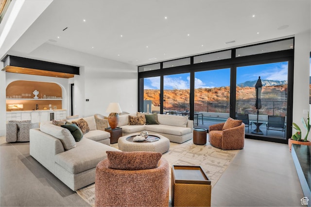 63 E Colima Rd, Washington, UT 84780 - living area featuring recessed lighting, a mountain view, and a wall of windows