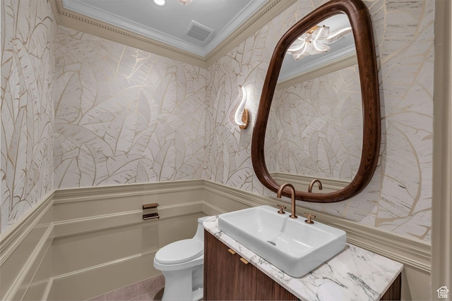 63 E Colima Rd, Washington, UT 84780 - bathroom featuring wallpapered walls, ornamental molding, wainscoting, toilet, and vanity