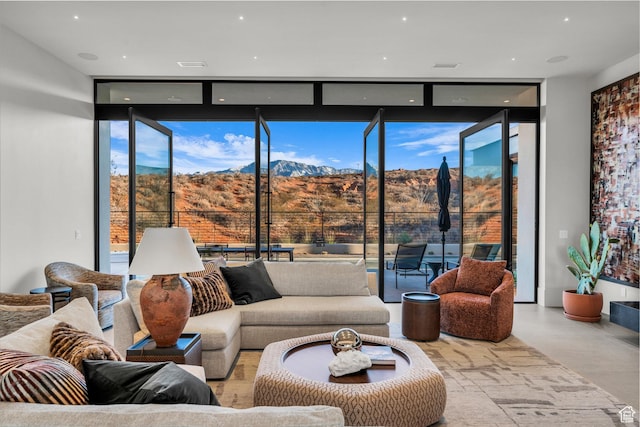 63 E Colima Rd, Washington, UT 84780 - living area with floor to ceiling windows and a mountain view