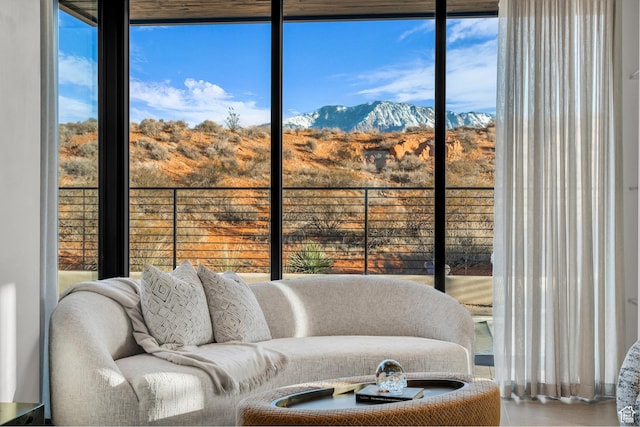 63 E Colima Rd, Washington, UT 84780 - living area featuring a mountain view and healthy amount of natural light