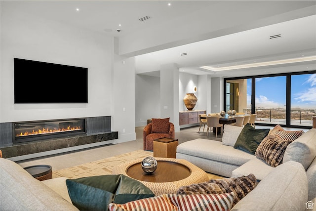 63 E Colima Rd, Washington, UT 84780 - living room featuring a fireplace, recessed lighting, and baseboards
