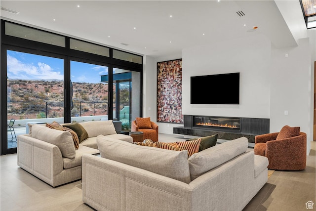 63 E Colima Rd, Washington, UT 84780 - living area with a premium fireplace and recessed lighting