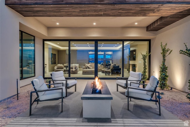 63 E Colima Rd, Washington, UT 84780 - view of patio with an outdoor living space with a fire pit