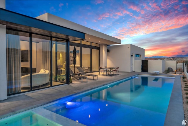 63 E Colima Rd, Washington, UT 84780 - view of swimming pool with a patio and a diving board