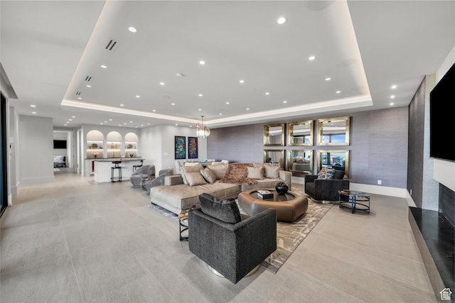 63 E Colima Rd, Washington, UT 84780 - living area with a raised ceiling, recessed lighting, a fireplace, and light tile patterned floors