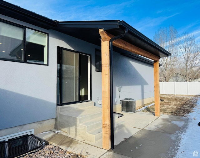 205 W 400 S, Ephraim, UT 84627 - entrance to property with a patio area, cooling unit, and stucco siding