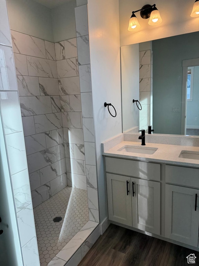 205 W 400 S, Ephraim, UT 84627 - full bath with double vanity, wood finished floors, and a tile shower