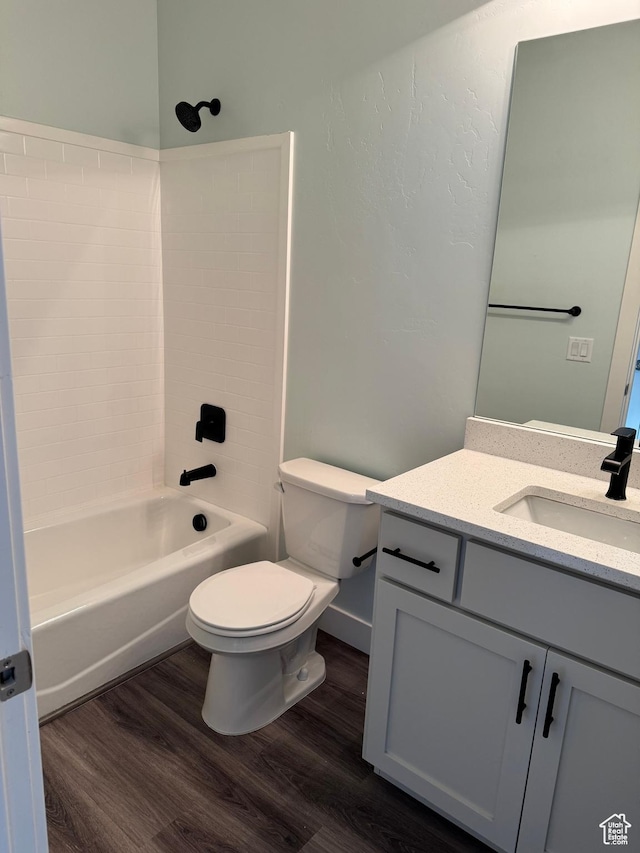 205 W 400 S, Ephraim, UT 84627 - bathroom featuring wood finished floors, toilet, vanity, and  shower combination