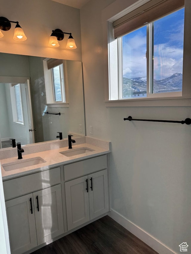 205 W 400 S, Ephraim, UT 84627 - full bath with baseboards, wood finished floors, and double vanity