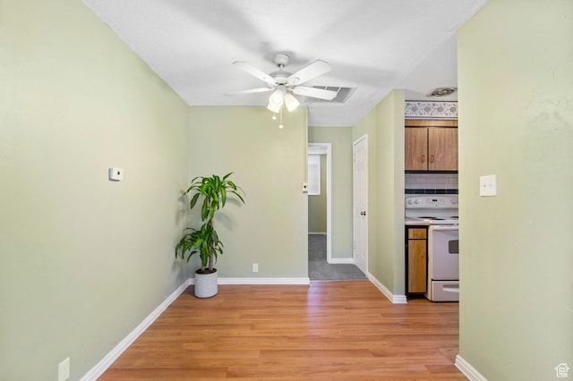 4409 S Rosehaven Ct Unit B, West Valley City, UT 84120 - interior space with light wood finished floors, baseboards, and visible vents