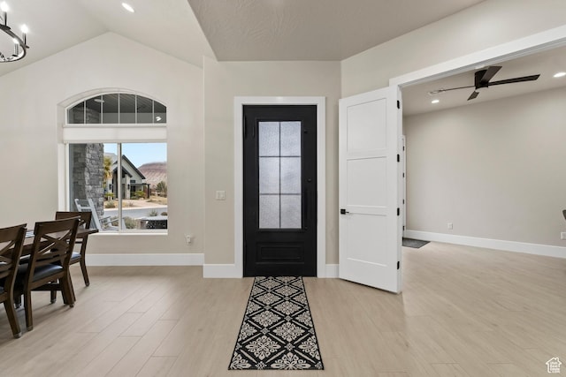802 E Prairie Way, Washington, UT 84780 - entryway with lofted ceiling, ceiling fan with notable chandelier, and light hardwood / wood-style floors