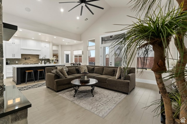 802 E Prairie Way, Washington, UT 84780 - living room with sink, light hardwood / wood-style flooring, high vaulted ceiling, and ceiling fan