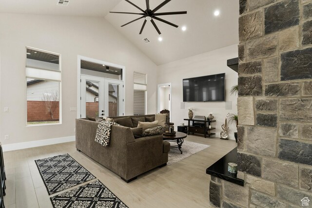 802 E Prairie Way, Washington, UT 84780 - living room featuring light hardwood / wood-style flooring, high vaulted ceiling, french doors, and ceiling fan