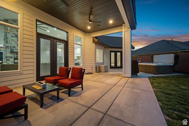 802 E Prairie Way, Washington, UT 84780 - patio terrace at dusk featuring french doors, ceiling fan, and a hot tub