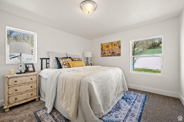 160 N Adams Ave E, Ogden, UT 84404 - bedroom featuring baseboards and dark carpet