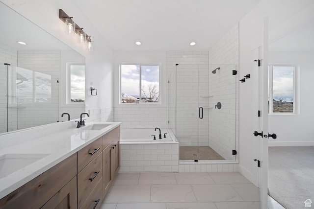 bathroom with vanity and plus walk in shower