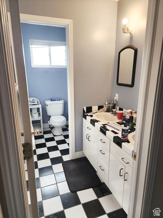 8298 S Arlington Ct, West Jordan, UT 84088 - bathroom with vanity and toilet