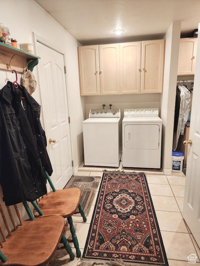 8298 S Arlington Ct, West Jordan, UT 84088 - laundry area with cabinets, light tile patterned flooring, and washing machine and clothes dryer