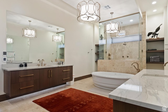 2015 S Pinnacle Cir, St George, UT 84790 - bathroom featuring vanity and independent shower and bath