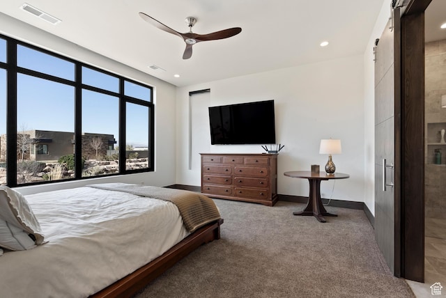 2015 S Pinnacle Cir, St George, UT 84790 - carpeted bedroom featuring a barn door and ceiling fan