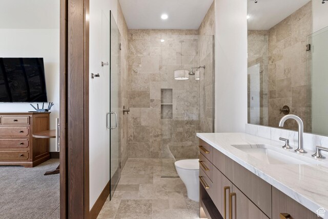 2015 S Pinnacle Cir, St George, UT 84790 - bathroom featuring vanity, an enclosed shower, and toilet