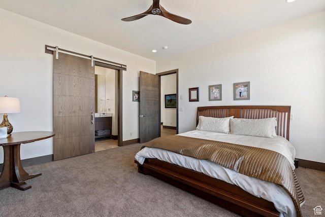 2015 S Pinnacle Cir, St George, UT 84790 - bedroom with ceiling fan, a barn door, carpet floors, and ensuite bath