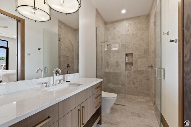 2015 S Pinnacle Cir, St George, UT 84790 - bathroom with vanity, toilet, and walk in shower
