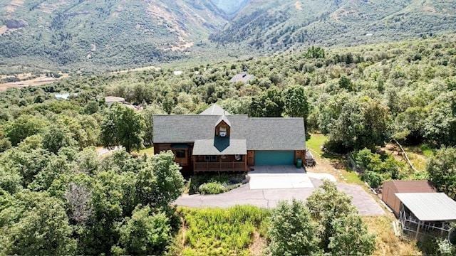 485 S Woodland Hills Dr, Woodland Hills, UT 84653 - view of subject property featuring a heavily wooded area and a mountain backdrop